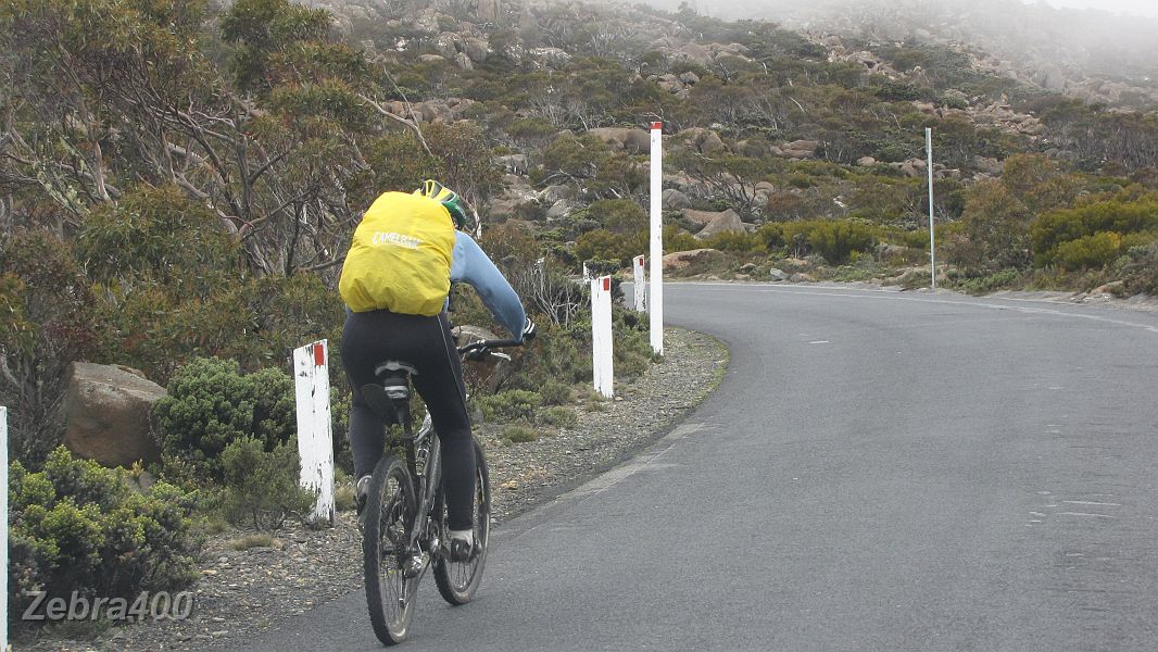 17-The cloud rolls in as Heidi approaches the summit.JPG